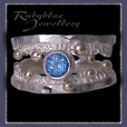 10 Karat Yellow Gold, Teal Blue Topaz and Sterling Silver 'Chicl' Ring Image
