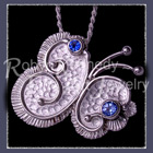 Sterling Silver, Glacier and Paradise Blue Genuine Diffused Topaz 'Flutterby' Pendant / Brooch Image
