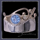 14 Karat Yellow Gold, Sterling Silver and Ice Blue Topaz 'Twilight' Ring Image
