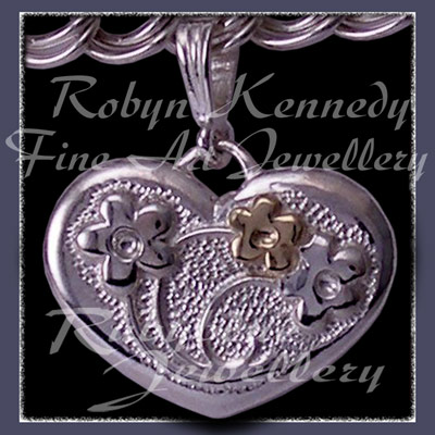 Sterling Silver and 14 Karat Yellow Gold Forget-Me-Not Heart Charm Image