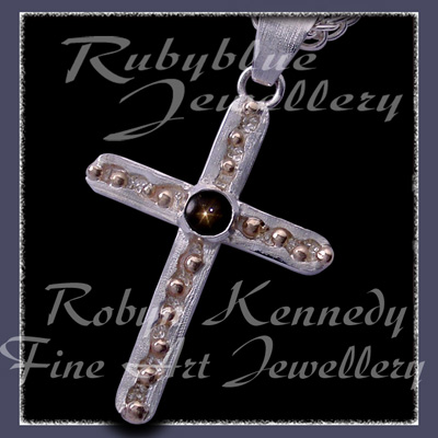 10 karat Yellow Gold, Sterlium Silver and Genuine Black Star Sapphire 'Eternal Star Cross' Pendant Image