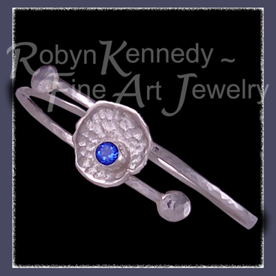 Sterling Silver and Glacier Blue Topaz 'Fleur' Bangle Bracelet Image