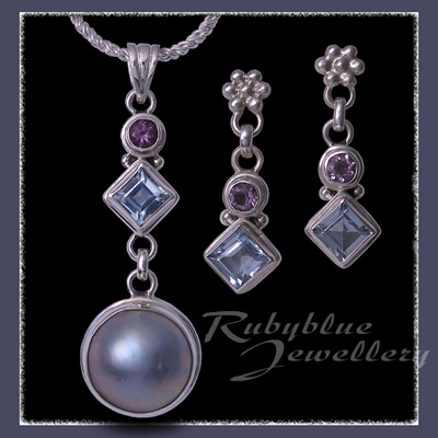 Sterling Silver, Blue Topaz and Amethyst 'Into the Blue' Pendant and Earrings Image