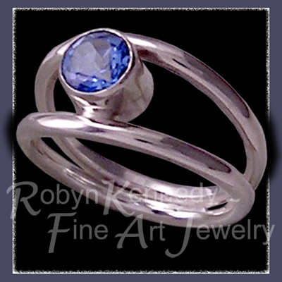 Sterling Silver and Genuine Paradise Blue Topaz 'Orbit' Ring Image