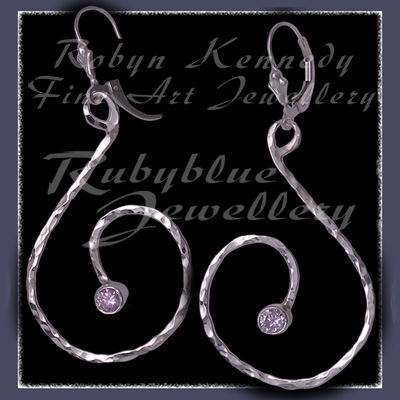 Sterling Silver and Lavendar Cubic Zirconia 'Swirls' Earrings Image