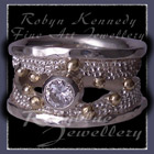10 Karat Yellow Gold, Sterling Silver and Cubic Zirconia  'Chic' Ring Image