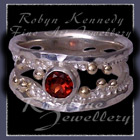 10 Karat Yellow Gold, Sterling Silver and AA Mozambique Garnet 'Chicl' Ring Image