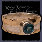 10 Karat Yellow Gold, Sterling Silver and Genuine Evergreen Diffused Topaz 'Eden' Ring Image