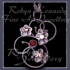 10 Karat Yellow Gold, Sterling Silver and Mozambique Garnet 'Feeling Groovy' Pendant Image