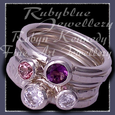 Sterling Silver, Amethyst, Baby Pink Topaz ans Sworovski Cubic Zirconias 'Revelry' Stacker Ring Set Image