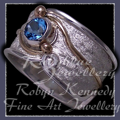 10 Karat Yellow Gold, Sterling Silver and Swiss Blue Topaz 'Serenity' Ring Image